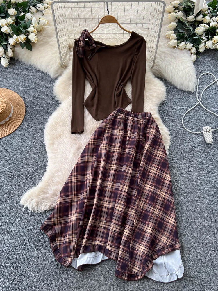 Комплект с юбкой в клетку во французском стиле, женский осенний топ с закругленными бретелями, юбка с высокой талией, костюм из двух предметов, повседневная одежда
Комплект с юбкой в клетку во французском стиле, женский осенний топ с закругленными бретелями, юбка с высокой талией, костюм из двух предметов, повседневная одежда