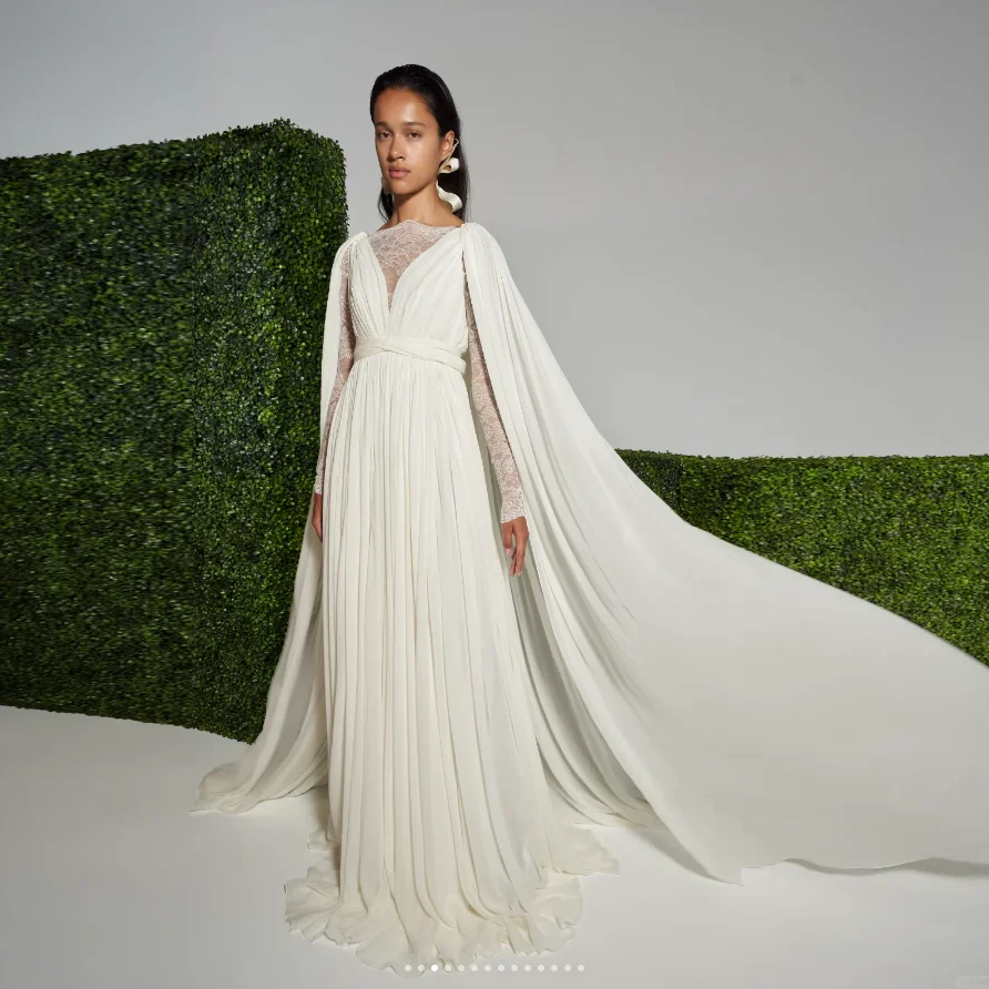 A Line Maxi Party Dresses With Train Chiffon Dubai Wedding Gowns Romance with Lace Sleeve Cloak Behind Newest Bride Dress
A Line Maxi Party Dresses With Train Chiffon Dubai Wedding Gowns Romance with Lace Sleeve Cloak Behind Newest Bride Dress