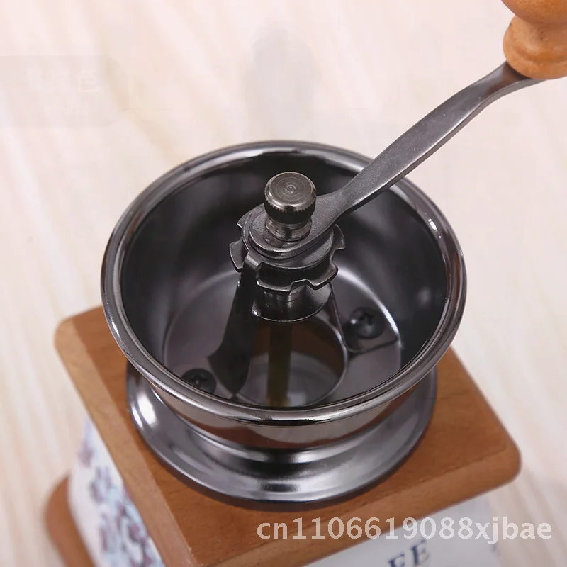 Ручная кофемолка в винтажном стиле, ручная кофемолка для кофейных зерен, белая керамическая круглая банка, керамическая ручная кофемашина для любителей кофе 
Ручная кофемолка в винтажном стиле, ручная кофемолка для кофейных зерен, белая керамическая круглая банка, керамическая ручная кофемашина для любителей кофе