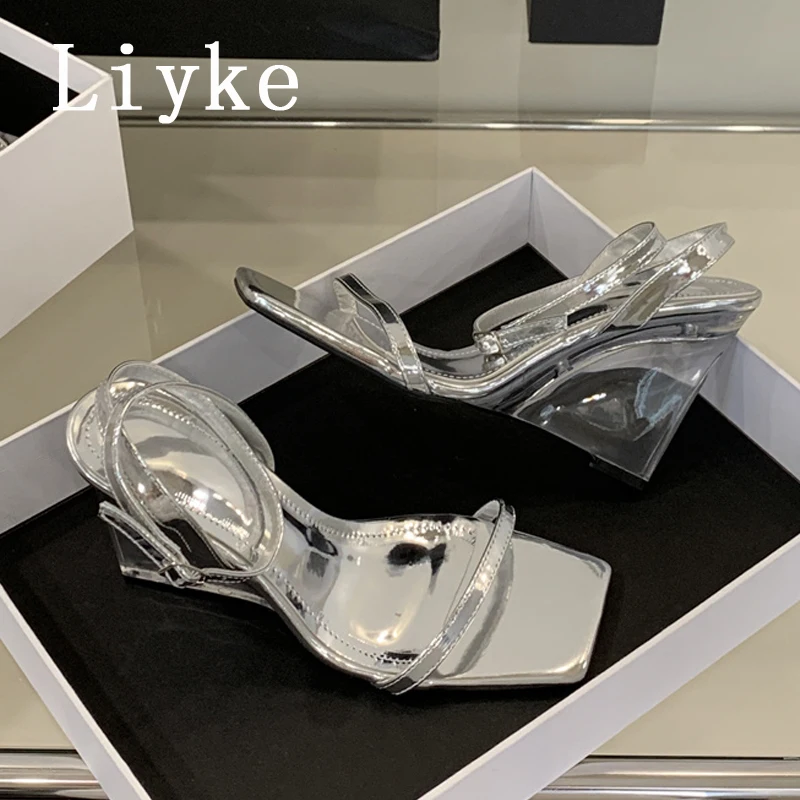 Liyke 2025 новые модные прозрачные босоножки на танкетке из плексигласа, женские летние туфли на высоком каблуке с квадратным открытым носком, серебряные туфли для выпускного вечера, размер 40
Liyke 2025 новые модные прозрачные босоножки на танкетке из плексигласа, женские летние туфли на высоком каблуке с квадратным открытым носком, серебряные туфли для выпускного вечера, размер 40