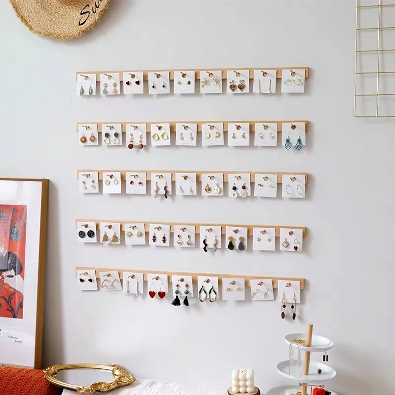 Серьги из бука, ожерелье, подставка для ювелирных изделий для магазина одежды, настенный органайзер для хранения шляп Ra Sos
Серьги из бука, ожерелье, подставка для ювелирных изделий для магазина одежды, настенный органайзер для хранения шляп Ra Sos