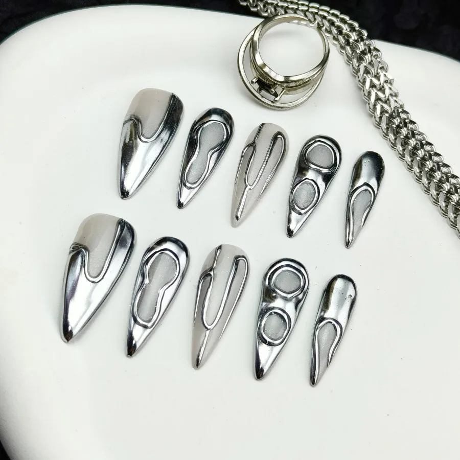 Handmade pressed fake nails, silver minimalist style, adhesive fake nails, long pointed style, simulated artificial nails.
Handmade pressed fake nails, silver minimalist style, adhesive fake nails, long pointed style, simulated artificial nails.