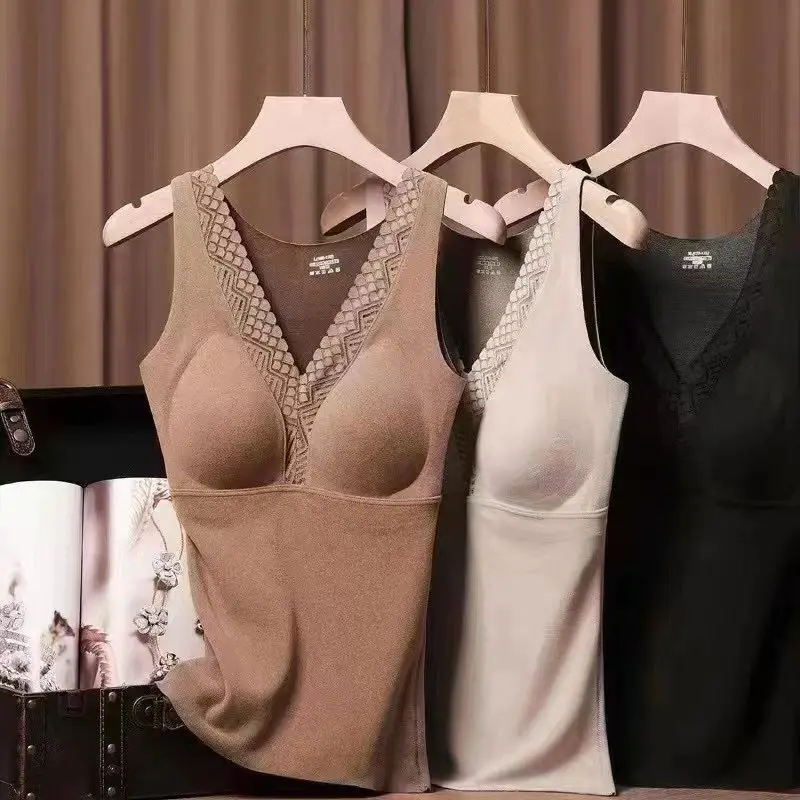 Осень-зима, новая цельная теплая майка с подушечками на груди, женская майка с v-образным вырезом, бесследный ремень, безносный бюстгальтер, майка, термоодежда
Осень-зима, новая цельная теплая майка с подушечками на груди, женская майка с v-образным вырезом, бесследный ремень, безносный бюстгальтер, майка, термоодежда