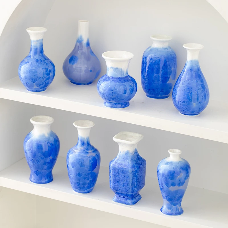 Ceramic vase with creative blue crystalline glaze, small size, high-end decorative piece
Ceramic vase with creative blue crystalline glaze, small size, high-end decorative piece