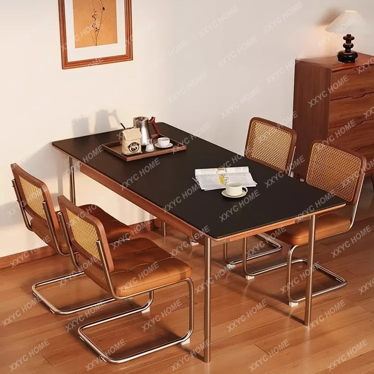 Medieval rock slab solid wood dining table family high-end new household small apartment rectangle
Medieval rock slab solid wood dining table family high-end new household small apartment rectangle