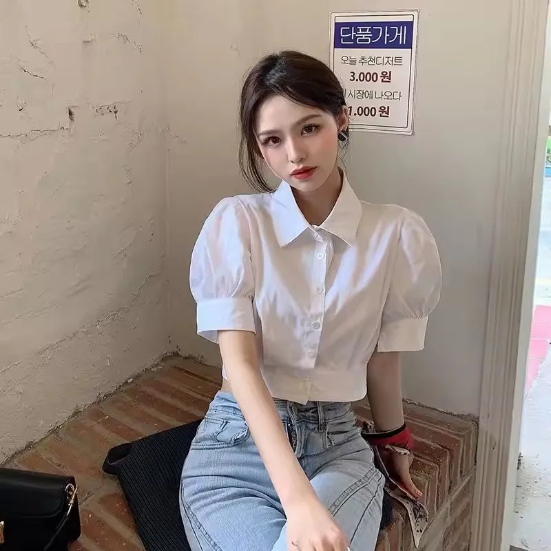 Korean Summer Puff Sleeve White Cropped Shirt Women Elegant Turn-down Collar Blouses Preppy Short Sleeve Cute Top Female Clothes
Korean Summer Puff Sleeve White Cropped Shirt Women Elegant Turn-down Collar Blouses Preppy Short Sleeve Cute Top Female Clothes