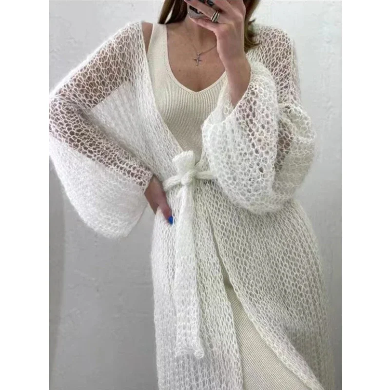 CPSYMYM Knitted Open Stitch Cardigan Sweater for Women Autumn Winter Solid Fashion Front Pocket Long Sweater Coat Loose
CPSYMYM Knitted Open Stitch Cardigan Sweater for Women Autumn Winter Solid Fashion Front Pocket Long Sweater Coat Loose