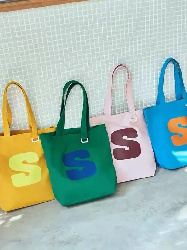 Fashionable Large Capacity Canvas Tote Bag Casual Handbag Simple Design Versatile Shoulder Bag for Youth Vertical Square Shape
Fashionable Large Capacity Canvas Tote Bag Casual Handbag Simple Design Versatile Shoulder Bag for Youth Vertical Square Shape