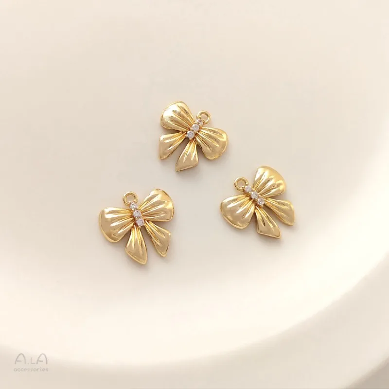 Подвеска-бантик из плиссированного циркона с покрытием из золота 14K, сохраняющая цвет, для самостоятельного изготовления браслетов, серег и ювелирных изделий
Подвеска-бантик из плиссированного циркона с покрытием из золота 14K, сохраняющая цвет, для самостоятельного изготовления браслетов, серег и ювелирных изделий