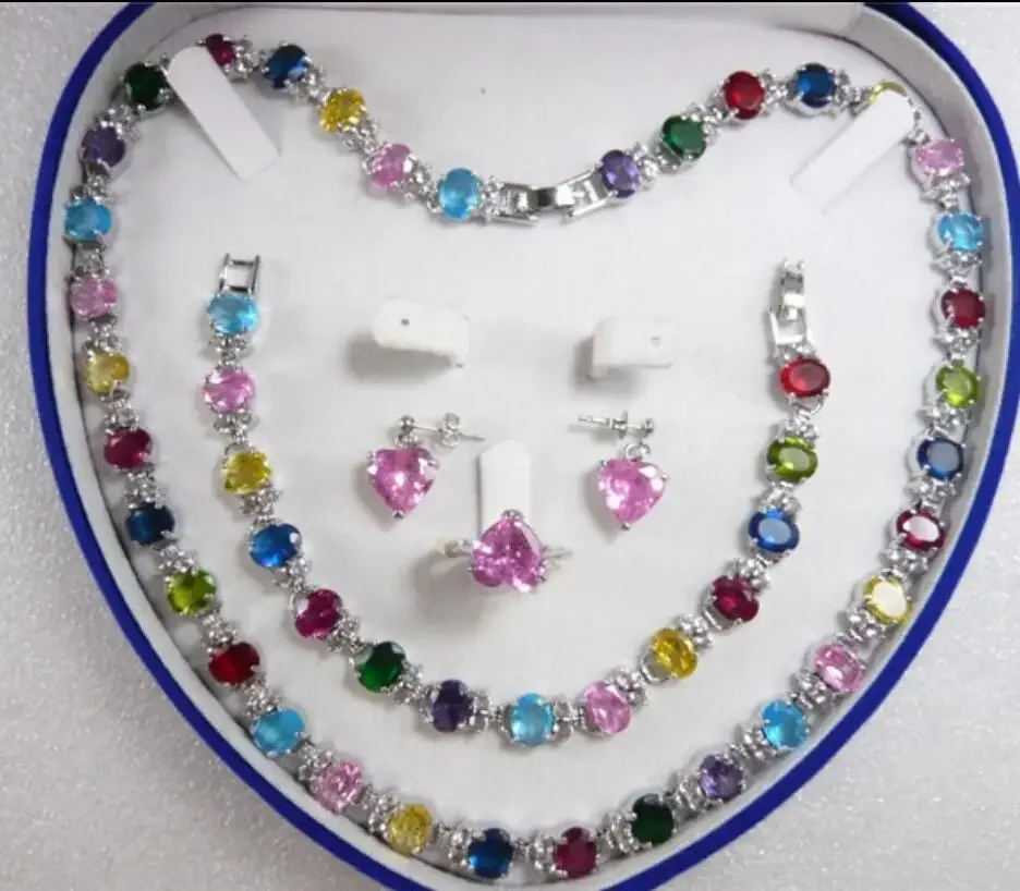 Женское темпераментное модное металлическое посеребренное ожерелье в форме яйца в форме яйца с граненым цирконом + браслет + серьги + Ri 
Женское темпераментное модное металлическое посеребренное ожерелье в форме яйца в форме яйца с граненым цирконом + браслет + серьги + Ri