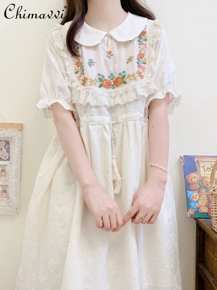 Japanese Sweet Girl Embroidered Short Sleeve Cotton Dress for Women 2024 Summer Doll Collar Puff Sleeve Lace-up Loose Dresses
Japanese Sweet Girl Embroidered Short Sleeve Cotton Dress for Women 2024 Summer Doll Collar Puff Sleeve Lace-up Loose Dresses