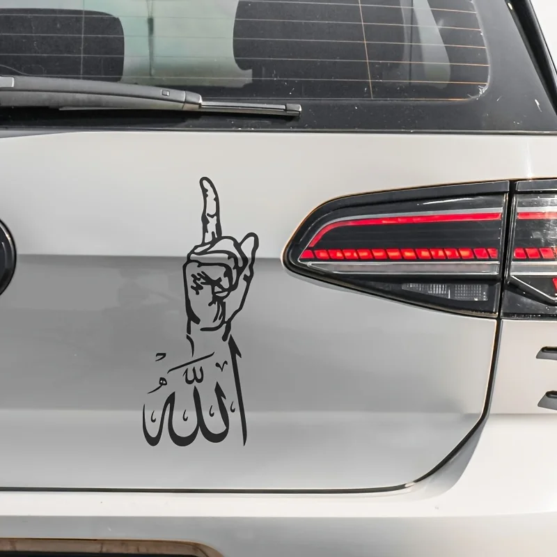 An Islamic calligrapher holding up a finger car decal, a white, waterproof vinyl window sticker symbolizing faith and devotion.
An Islamic calligrapher holding up a finger car decal, a white, waterproof vinyl window sticker symbolizing faith and devotion.