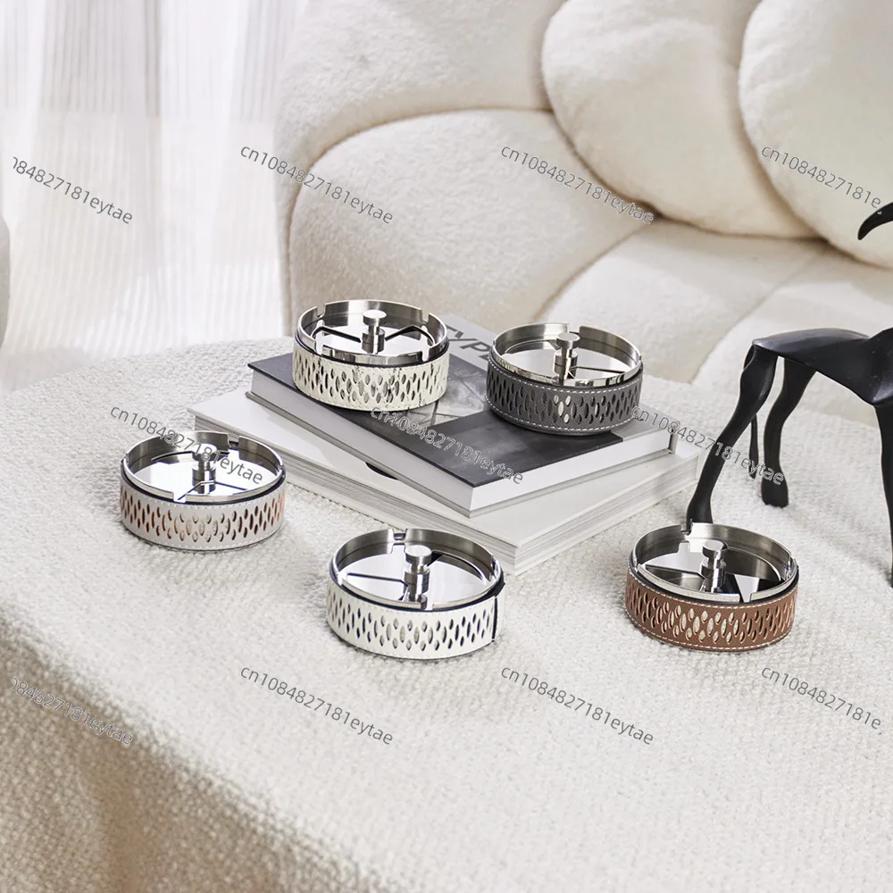 Simple leather stainless steel ashtray, living room home decoration, office, hotel, model room
Simple leather stainless steel ashtray, living room home decoration, office, hotel, model room