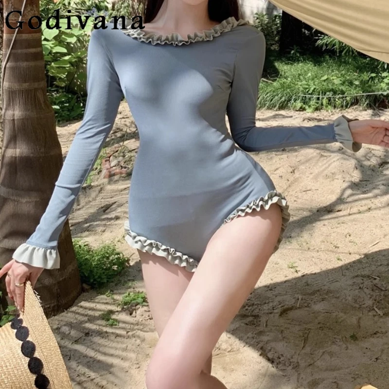Women's New One-piece Long Sleeve Sexy Backless Ruffles Swimsuit Summer Seaside Vacation Romantic Triangular One-piece Swimwear
Women's New One-piece Long Sleeve Sexy Backless Ruffles Swimsuit Summer Seaside Vacation Romantic Triangular One-piece Swimwear
