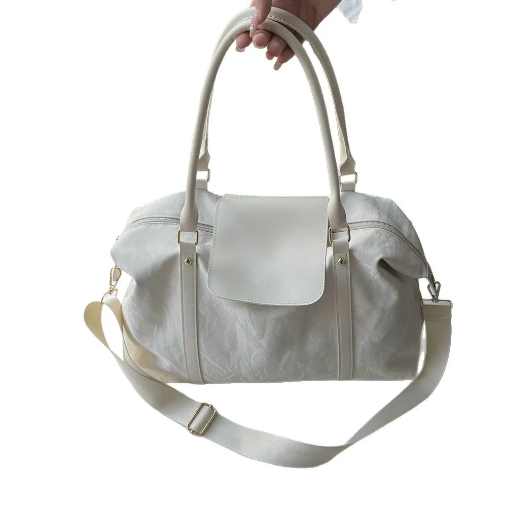 Soft leather texture out travel bag large capacity simple shoulder sports bag men and women short distance luggage storage bags
Soft leather texture out travel bag large capacity simple shoulder sports bag men and women short distance luggage storage bags
