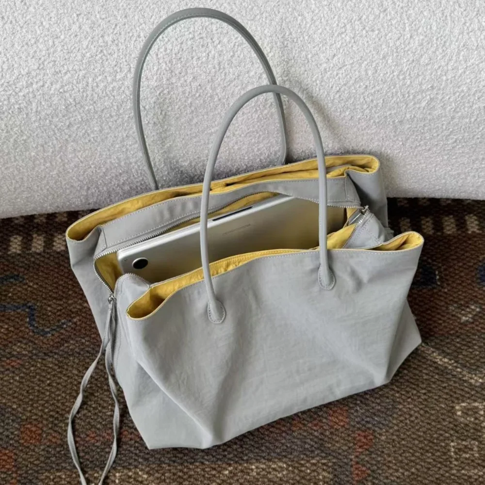Nylon Women's Commuter Tote Bag Minimalist Large-capacity Tote Bag Ladies Multi-layer Waterproof Computer Shoulder Nylon Handbag
Nylon Women's Commuter Tote Bag Minimalist Large-capacity Tote Bag Ladies Multi-layer Waterproof Computer Shoulder Nylon Handbag