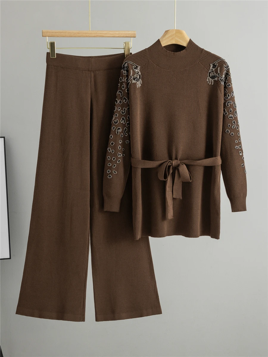 Spring 2026 Women's Fashion Knitted Sweater And Wide Leg Pants Two Piece Set Mid-Length Beaded Embroidery Slimming Waist Design
Spring 2026 Women's Fashion Knitted Sweater And Wide Leg Pants Two Piece Set Mid-Length Beaded Embroidery Slimming Waist Design