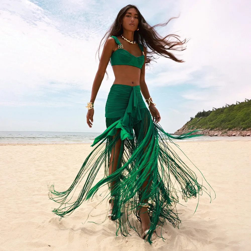 Новинка 2025 года, сексуальный повседневный пляжный комплект из двух предметов с высокой талией и длинной юбкой с кисточками, женский модный спортивный ансамбль
Новинка 2025 года, сексуальный повседневный пляжный комплект из двух предметов с высокой талией и длинной юбкой с кисточками, женский модный спортивный ансамбль