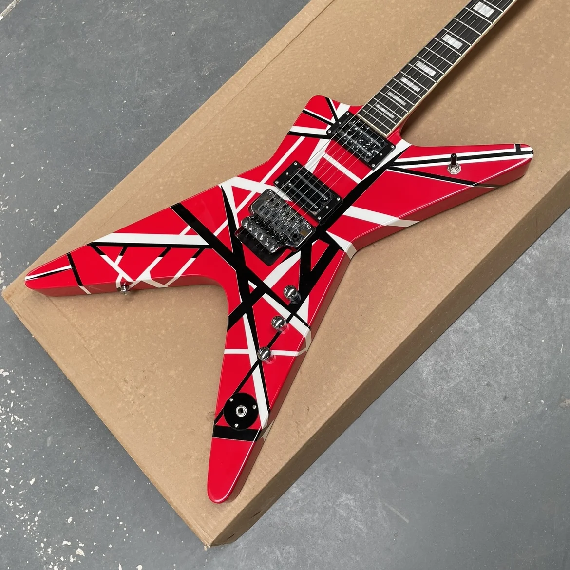6-string striped electric guitar with double-locking tremolo system and silver hardware guitars, portable guitarra
6-string striped electric guitar with double-locking tremolo system and silver hardware guitars, portable guitarra