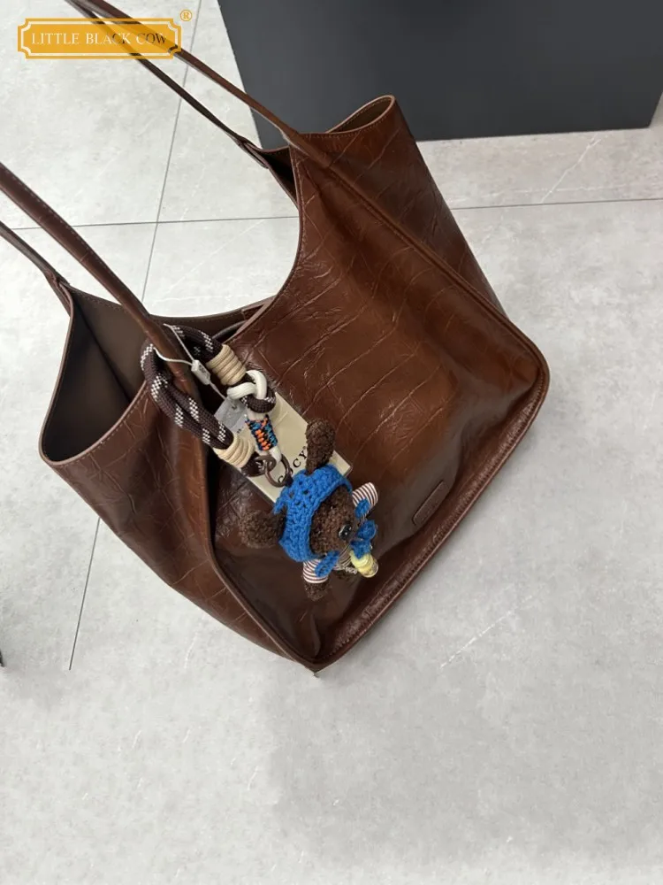 Новая женская повседневная сумка-тоут с пряжкой из искусственной кожи, сумка-мешок на одно плечо, большая вместительная офисная женская сумка через плечо под мышками
Новая женская повседневная сумка-тоут с пряжкой из искусственной кожи, сумка-мешок на одно плечо, большая вместительная офисная женская сумка через плечо под мышками