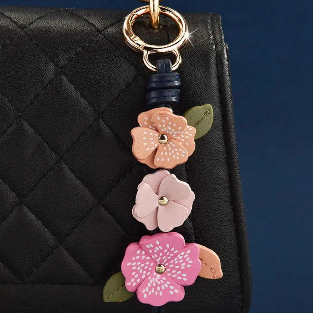 Модная вешалка с цветком из искусственной кожи, кулон в виде лотоса, автомобильный брелок, кожаный брелок, модная мультяшная сумка, подвеска, украшение для сумки
Модная вешалка с цветком из искусственной кожи, кулон в виде лотоса, автомобильный брелок, кожаный брелок, модная мультяшная сумка, подвеска, украшение для сумки