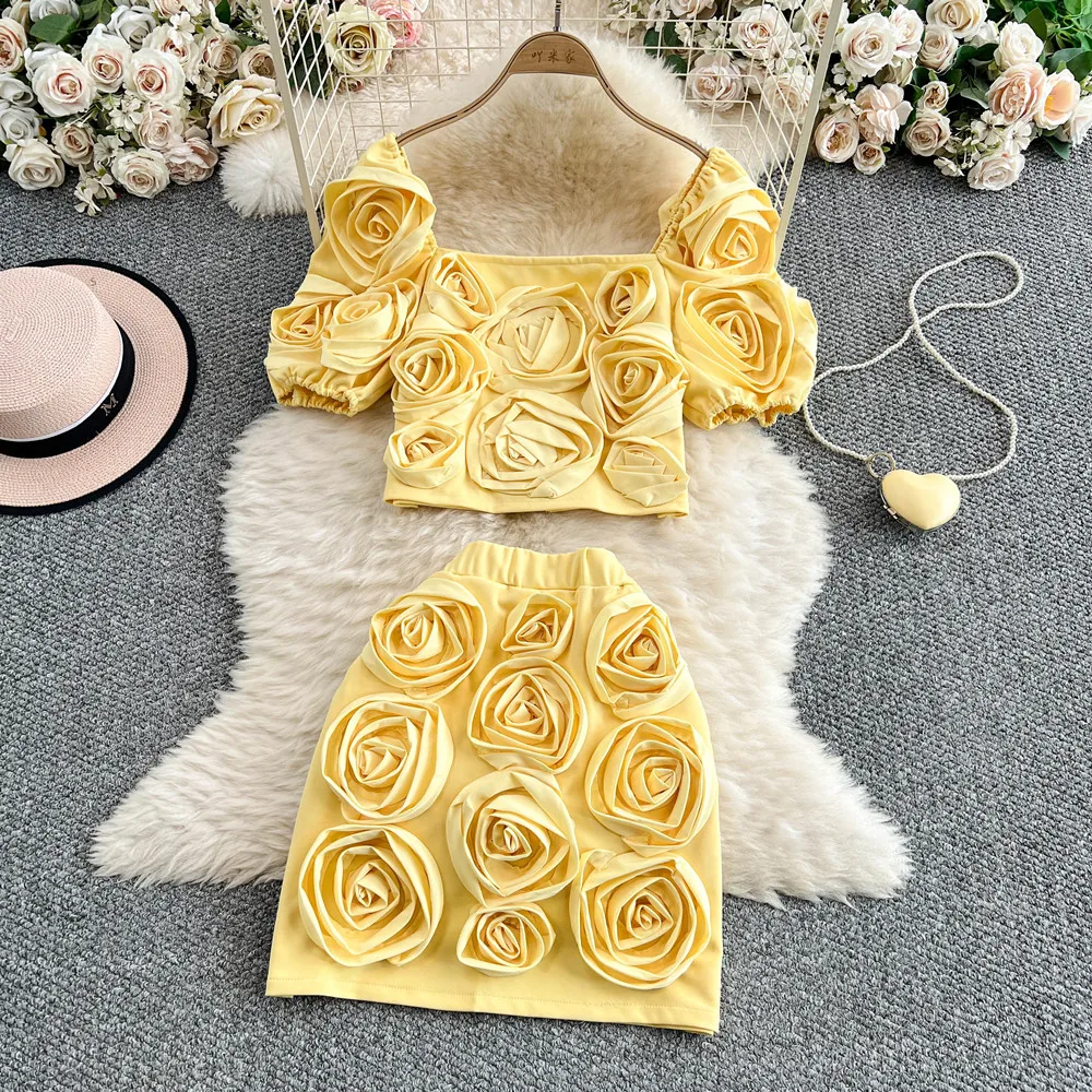 Fashion Women's Two-pieces Set Flower Shoulder Strap Top Three-dimensional Flowers Wrapped Hip Short Skirts 2 pieces set
Fashion Women's Two-pieces Set Flower Shoulder Strap Top Three-dimensional Flowers Wrapped Hip Short Skirts 2 pieces set