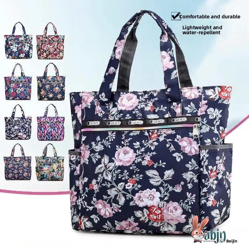 Новая вместительная сумка-шоппер из холщовой ткани и нейлона, водонепроницаемая, на плечо, женская сумка, сумка для мамы, с цветочным узором, повседневная сумка-тоут
Новая вместительная сумка-шоппер из холщовой ткани и нейлона, водонепроницаемая, на плечо, женская сумка, сумка для мамы, с цветочным узором, повседневная сумка-тоут