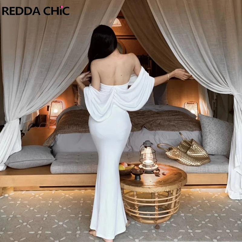 Женское платье с открытыми плечами ReddaChic, Элегантное Длинное белое однотонное облегающее платье из модала, облегающий корсет-русалка, облегающее свадебное платье
Женское платье с открытыми плечами ReddaChic, Элегантное Длинное белое однотонное облегающее платье из модала, облегающий корсет-русалка, облегающее свадебное платье