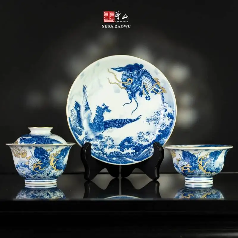 Sacred Mountain Antique-Style Blue White Porcelain Gold-Painted Unicorn And Phoenix Gaiwan, Jingdezhen Handmade Ceramic Tea Set
Sacred Mountain Antique-Style Blue White Porcelain Gold-Painted Unicorn And Phoenix Gaiwan, Jingdezhen Handmade Ceramic Tea Set