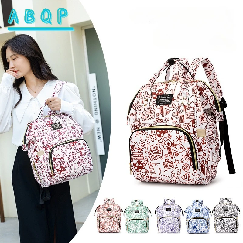 Новый рюкзак-сумка для подгузников большой вместимости, многофункциональный, модный, портативный, для хранения детских принадлежностей
Новый рюкзак-сумка для подгузников большой вместимости, многофункциональный, модный, портативный, для хранения детских принадлежностей