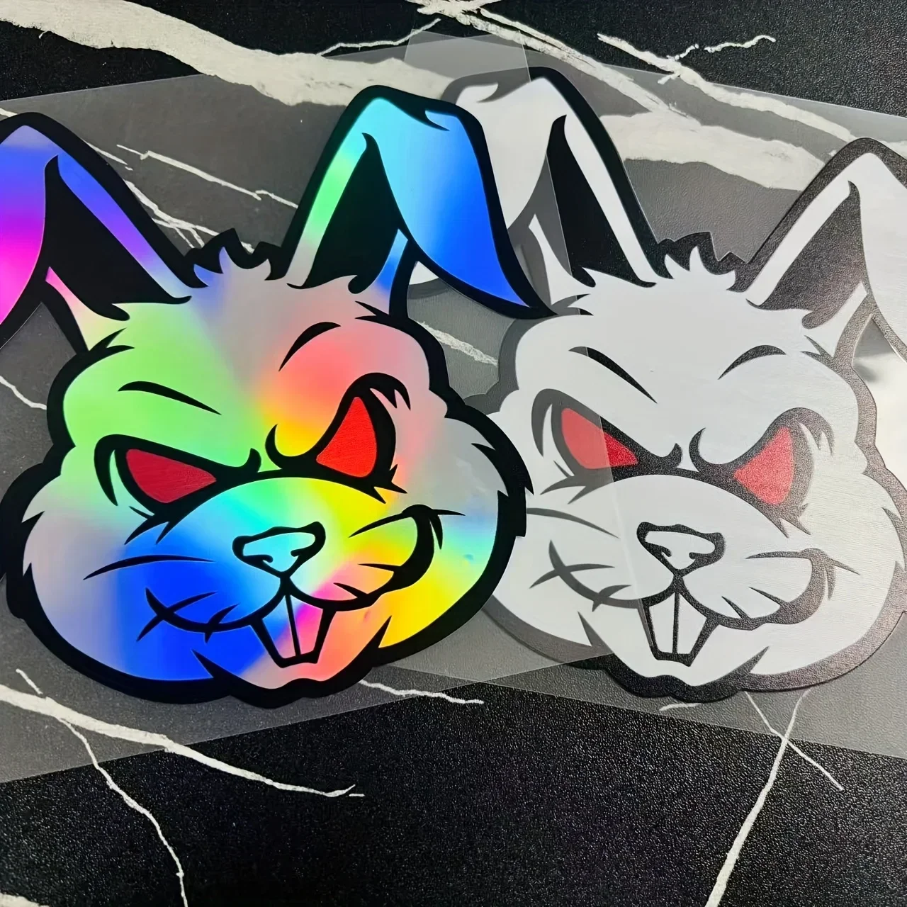 1PC Devil Rabbit Motorcycle Vinyl Stickers - Waterproof with Laser Effect, Glowing Red Eyes & Reflective Color-Changing Design
1PC Devil Rabbit Motorcycle Vinyl Stickers - Waterproof with Laser Effect, Glowing Red Eyes & Reflective Color-Changing Design