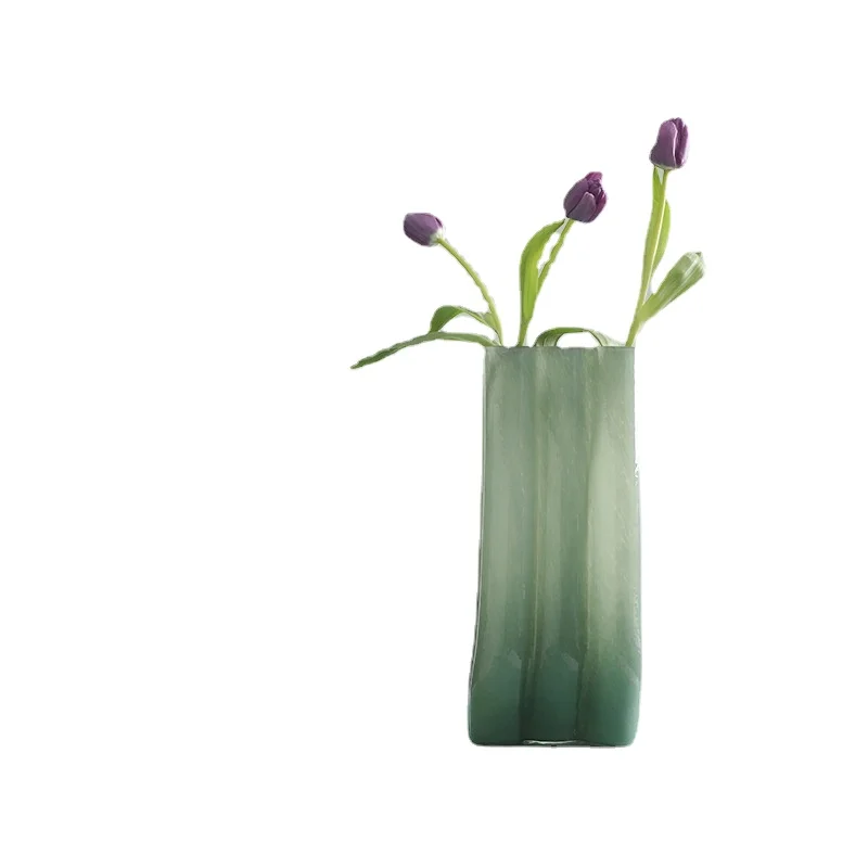 Milk green high-grade glass vase ornaments Modern and simple ins home living room flower ware
Milk green high-grade glass vase ornaments Modern and simple ins home living room flower ware