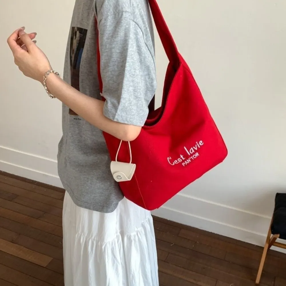 Простая корейская сумка через плечо с буквами, парусиновая большая вместительная студенческая сумка-тоут, повседневная универсальная женская сумка подмышками для девочек
Простая корейская сумка через плечо с буквами, парусиновая большая вместительная студенческая сумка-тоут, повседневная универсальная женская сумка подмышками для девочек