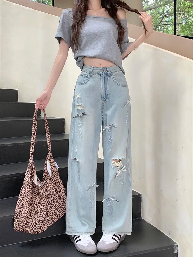 Large size ripped straight leg jeans for women spring and autumn loose high waist wide leg pants 2025 New
Large size ripped straight leg jeans for women spring and autumn loose high waist wide leg pants 2025 New