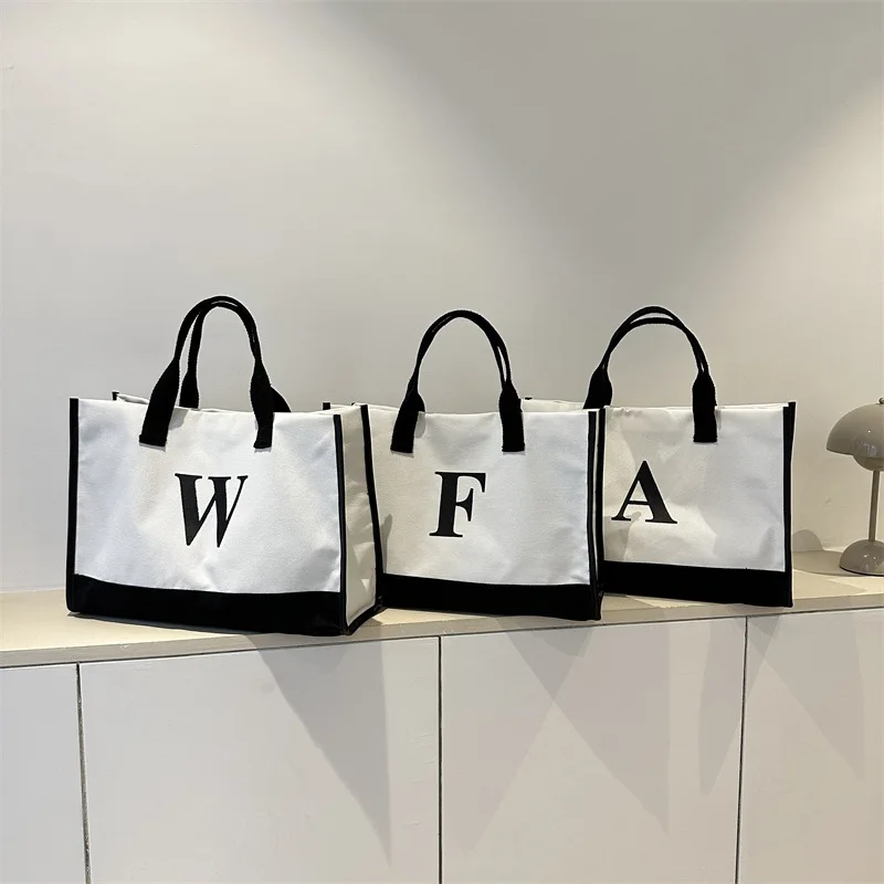 New style printed shoulder bag simple student thickened canvas bag hit color fashion handbag
New style printed shoulder bag simple student thickened canvas bag hit color fashion handbag