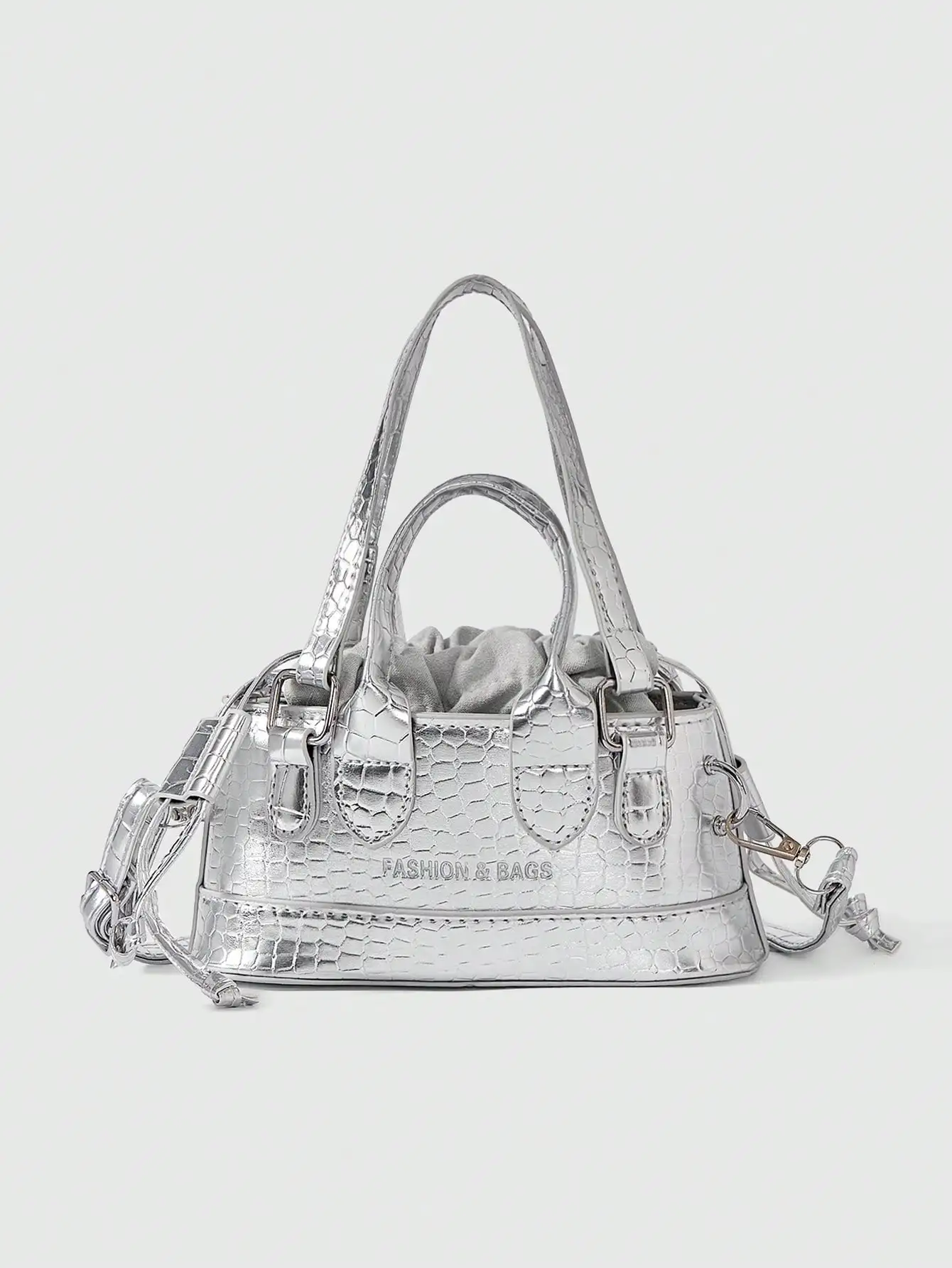 Серебристая металлическая мини-сумка с тиснением под крокодила, с верхней ручкой и застежкой на шнурке
Серебристая металлическая мини-сумка с тиснением под крокодила, с верхней ручкой и застежкой на шнурке
