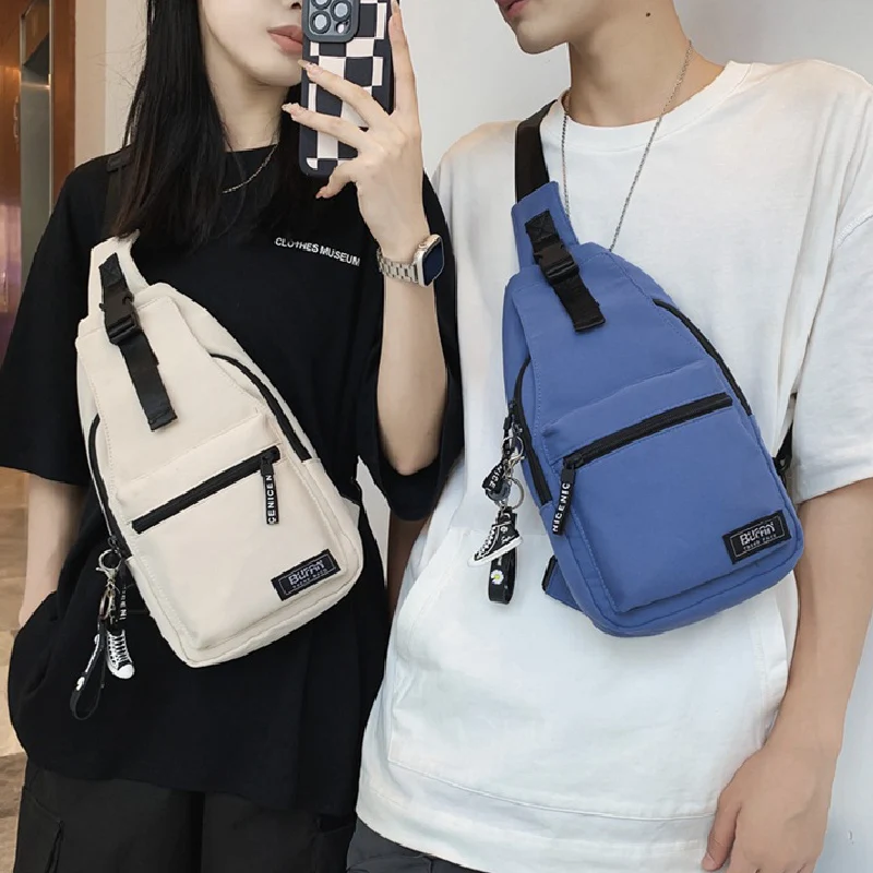 Fashion Couple Backpacks With Pendant 2022 New Solid Color Unisex Crossbody Bags High Quality Nylon Travel Shopping Chest Packs
Fashion Couple Backpacks With Pendant 2022 New Solid Color Unisex Crossbody Bags High Quality Nylon Travel Shopping Chest Packs