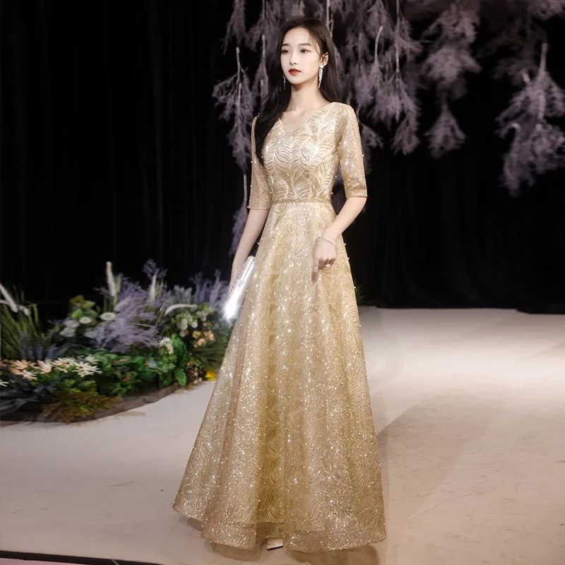 Women's Summer V-neck Gold Evening Dress Fashion Banquet Show Slimming Meeting Starry Sky Annual Meeting Lace Long Sleeve Dress
Women's Summer V-neck Gold Evening Dress Fashion Banquet Show Slimming Meeting Starry Sky Annual Meeting Lace Long Sleeve Dress