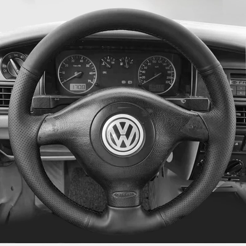 Чехол на руль для Volkswagen MK4 Golf 4 Santana Bora, ручной работы, из натуральной кожи, черный, с противоскользящим покрытием.
Чехол на руль для Volkswagen MK4 Golf 4 Santana Bora, ручной работы, из натуральной кожи, черный, с противоскользящим покрытием.