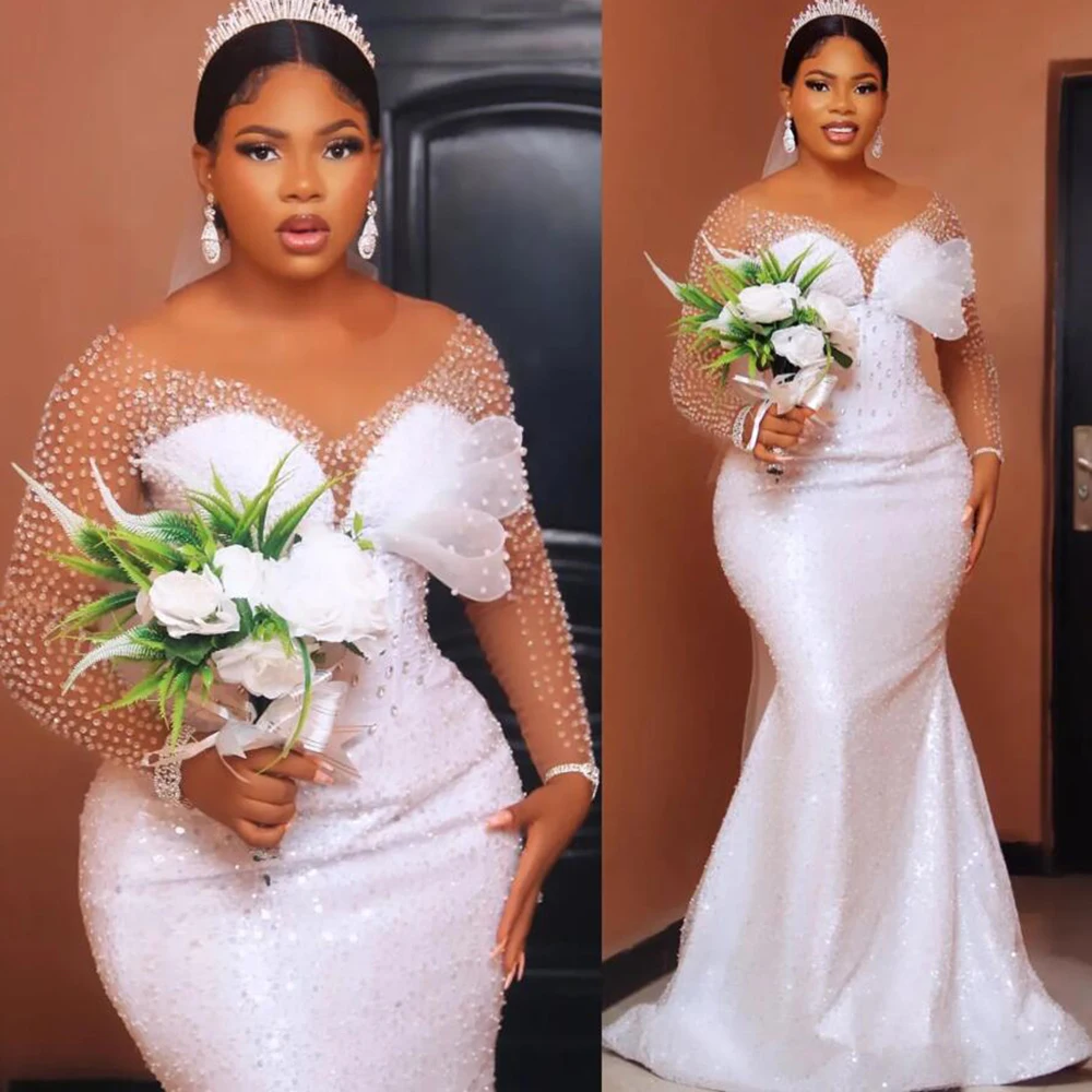 Роскошные арабские свадебные платья Aso Ebi с белой русалкой, блестящие свадебные платья по индивидуальному заказу, расшитые бисером и кристаллами, расшитая блестками, одежда для невесты
Роскошные арабские свадебные платья Aso Ebi с белой русалкой, блестящие свадебные платья по индивидуальному заказу, расшитые бисером и кристаллами, расшитая блестками, одежда для невесты