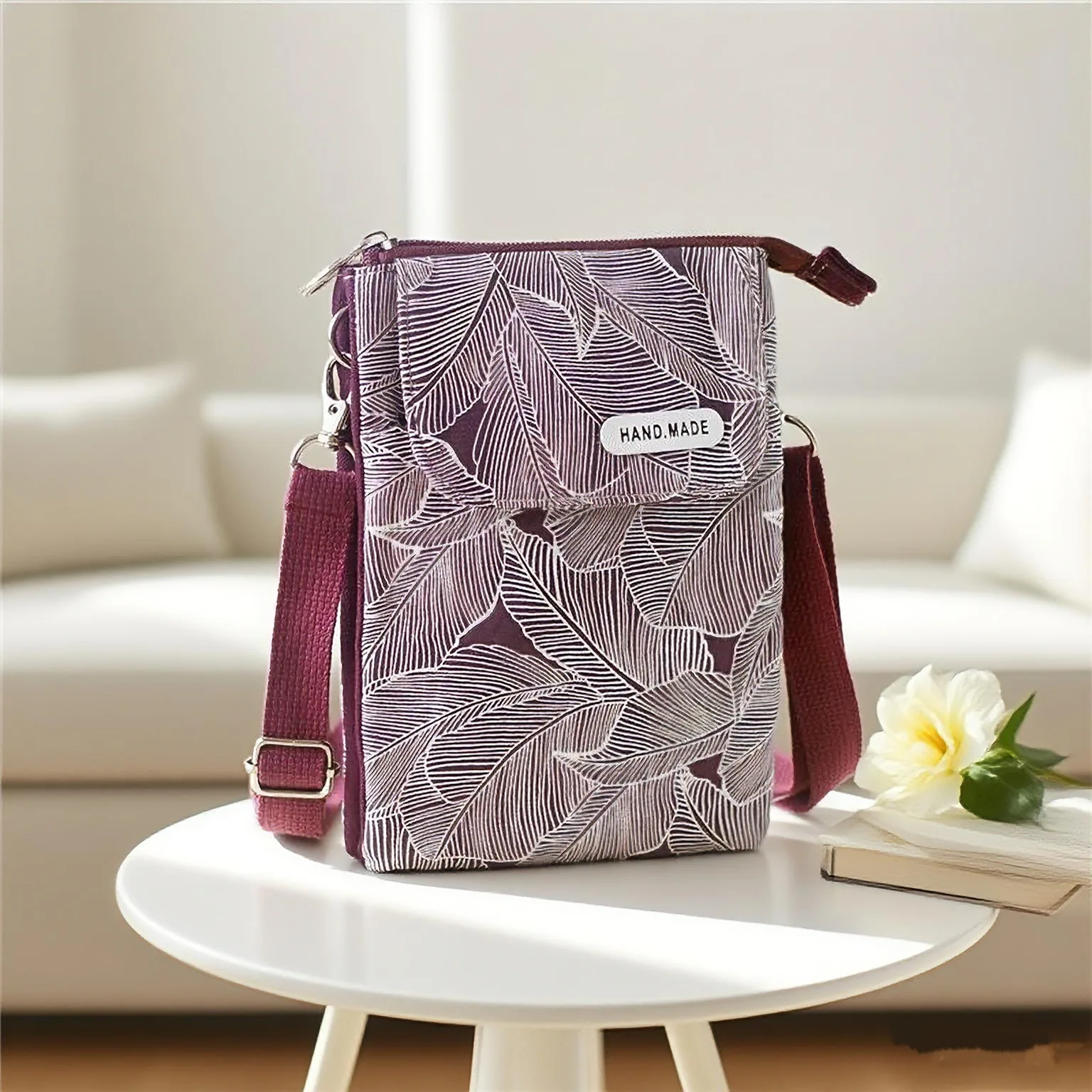 A 5-layer cross-body phone bag made of fabric with a large screen of rural leaves for women
A 5-layer cross-body phone bag made of fabric with a large screen of rural leaves for women