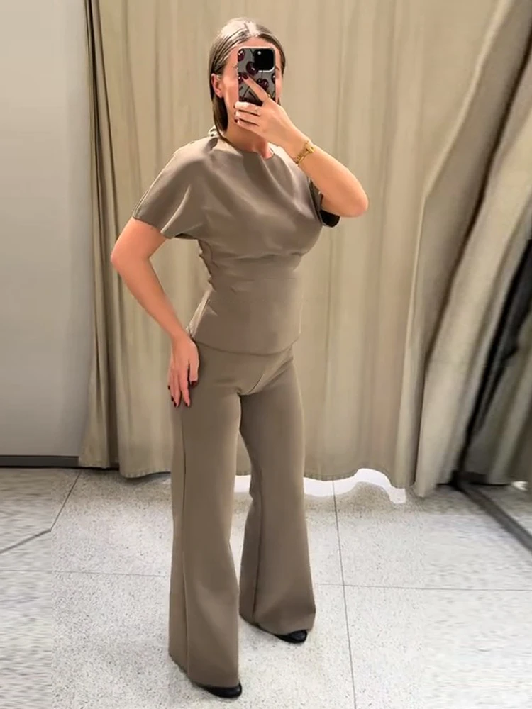 Summer Backless Top Pant Set Women Slim O-neck Short Sleeve Top High Waist Wide Leg Pant Female Suit 2026 Office Lady Suits
Summer Backless Top Pant Set Women Slim O-neck Short Sleeve Top High Waist Wide Leg Pant Female Suit 2026 Office Lady Suits