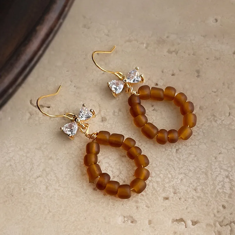 Fashion Zircon Bowknot Braided Beads Pendant Drop Earrings for Women Long Dangle Statement Ear Decoration Jewelry Party Girl
Fashion Zircon Bowknot Braided Beads Pendant Drop Earrings for Women Long Dangle Statement Ear Decoration Jewelry Party Girl