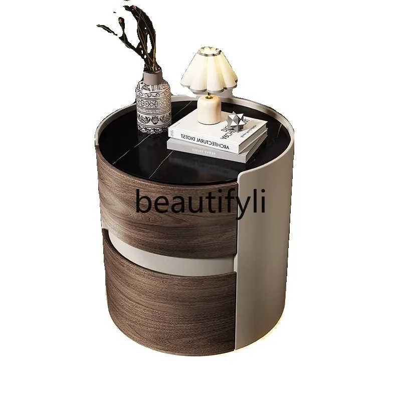 Designer's new round bedside table light luxury high-end Italian minimalist home bedroom bedside table
Designer's new round bedside table light luxury high-end Italian minimalist home bedroom bedside table