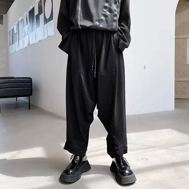 Темно-летние мужские классические трендовые висячие модные новые брюки с промежностью, повседневные свободные брюки большого размера, девять
Темно-летние мужские классические трендовые висячие модные новые брюки с промежностью, повседневные свободные брюки большого размера, девять