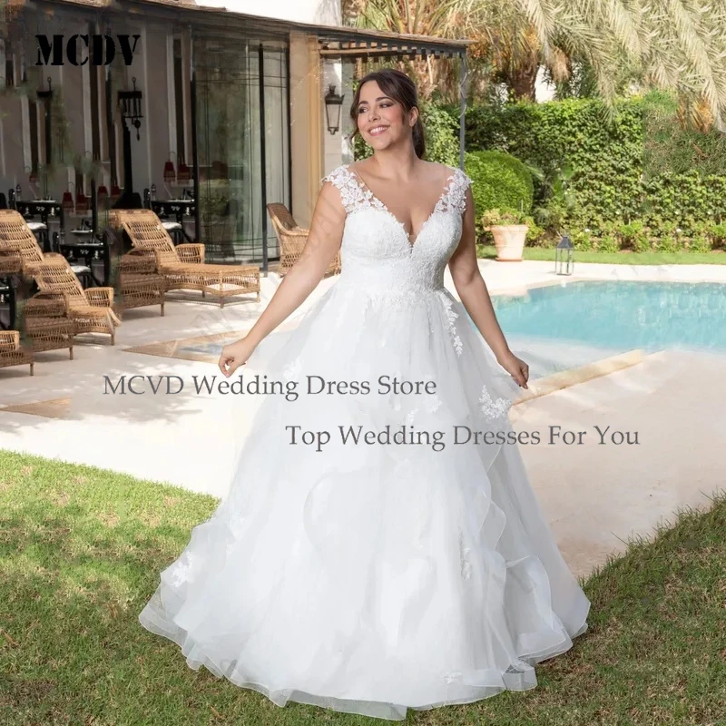 MCDV Women Wedding Dress 2024 A Line V Neck Cap Sleeves Appliques Oversize Tiered Bridal Party Gowns
MCDV Women Wedding Dress 2024 A Line V Neck Cap Sleeves Appliques Oversize Tiered Bridal Party Gowns