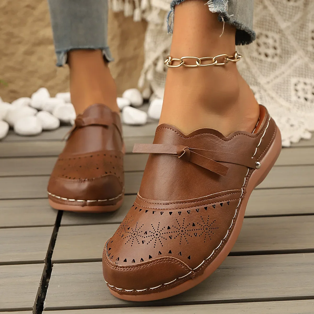 Summer new women's shoes bow hollow bag head flat sandals comfortable flower women's slippers
Summer new women's shoes bow hollow bag head flat sandals comfortable flower women's slippers