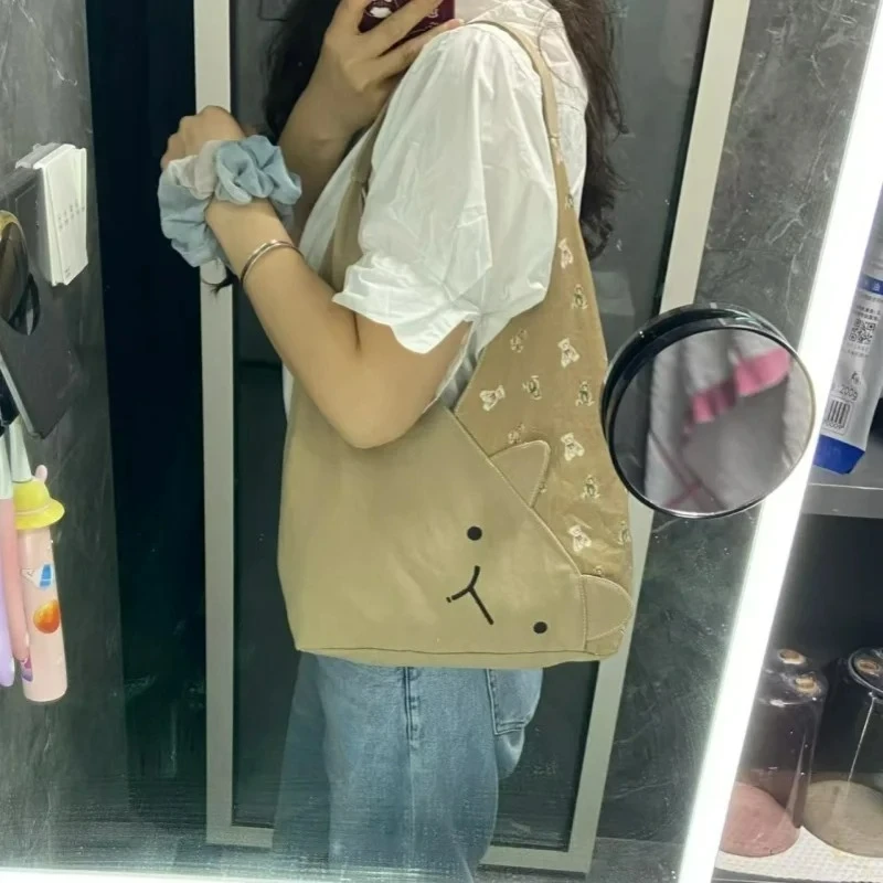 2025 Japanese Style New Cartoon Canvas Cute Cat Bucket Bag Casual Versatile Large Capacity Commuting Shoulder Bags
2025 Japanese Style New Cartoon Canvas Cute Cat Bucket Bag Casual Versatile Large Capacity Commuting Shoulder Bags