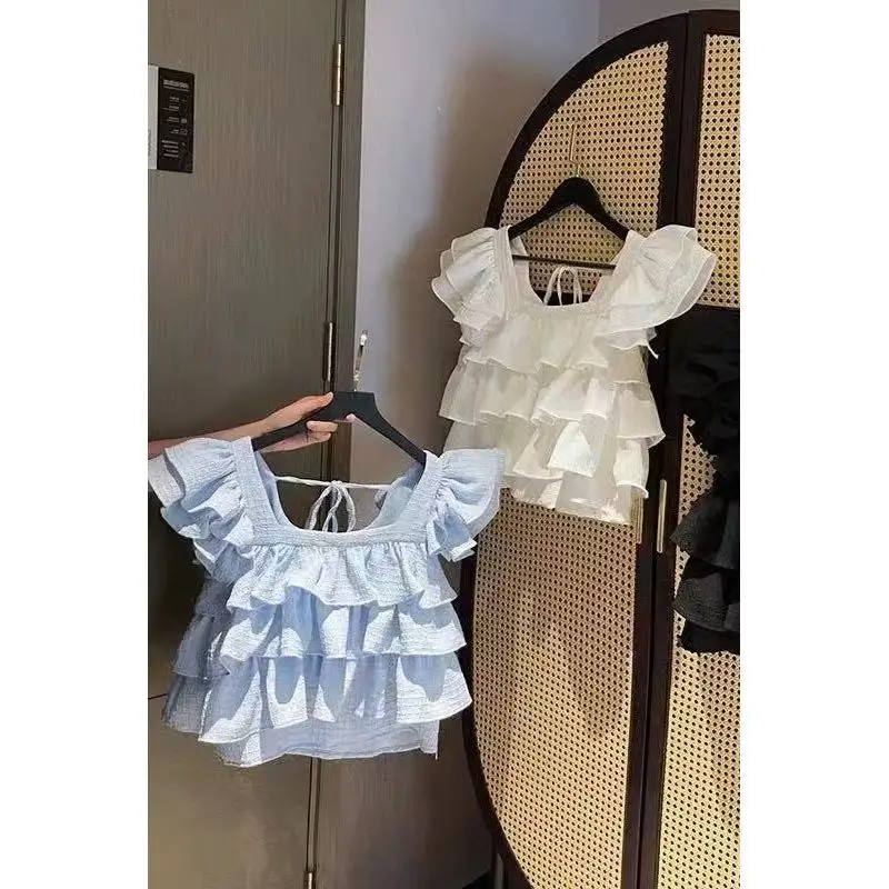 Korean Version Of Girls' Wooden Ear Edge Flying Sleeve Square Collar Shirt Children Summer Children Foreign Style Sleeveless Top
Korean Version Of Girls' Wooden Ear Edge Flying Sleeve Square Collar Shirt Children Summer Children Foreign Style Sleeveless Top