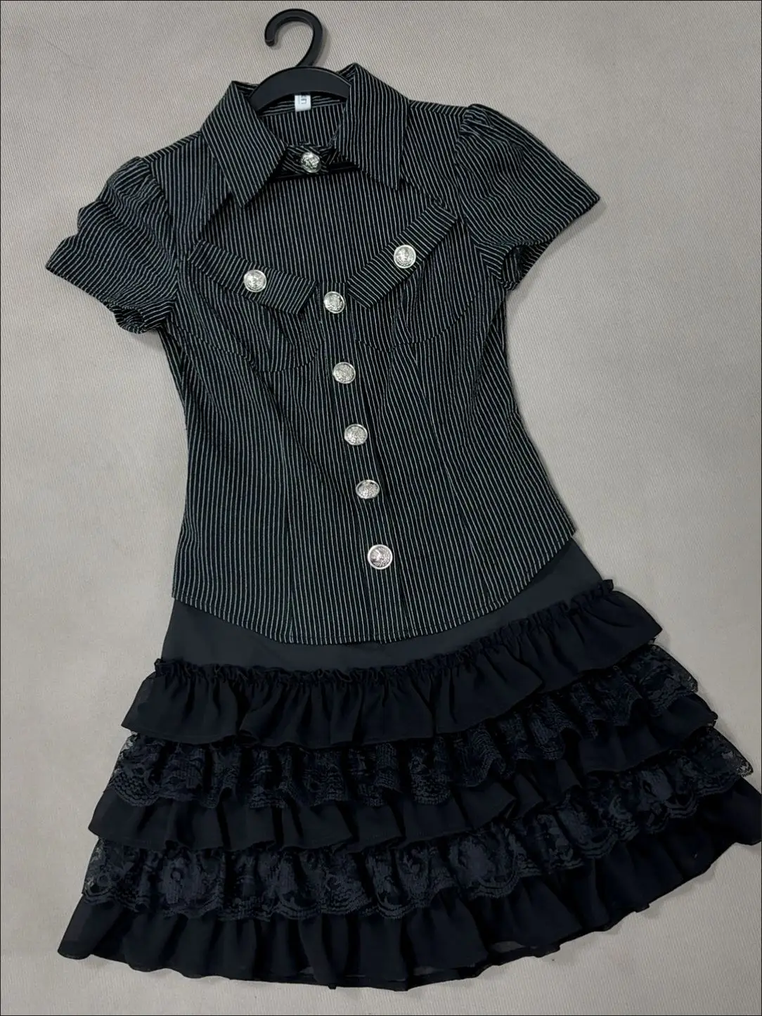 Goth Lolita Two Piece Outfit Women Striped Short Sleeve Cutout Collar Button Top Tiered Lace Ruffle Mini Skirt Y2K Streetwear
Goth Lolita Two Piece Outfit Women Striped Short Sleeve Cutout Collar Button Top Tiered Lace Ruffle Mini Skirt Y2K Streetwear